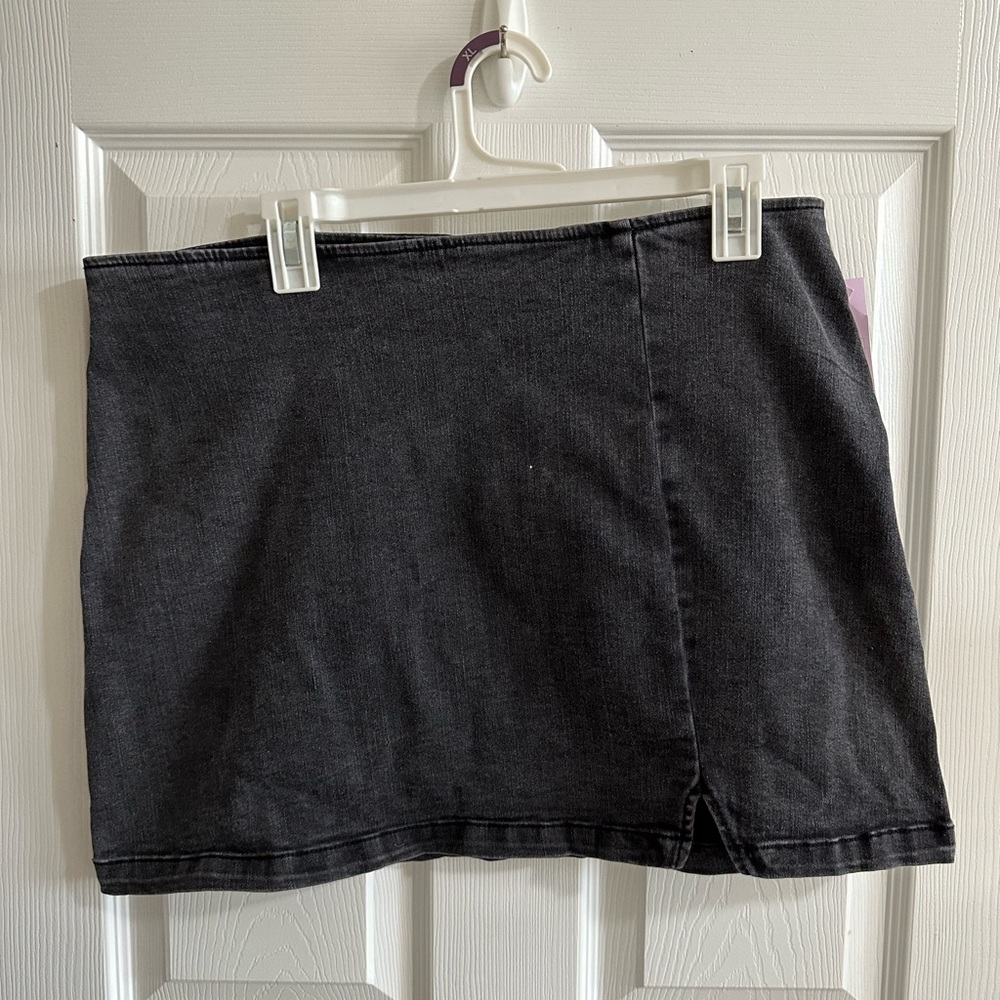 Faded washed black mini jean skirt